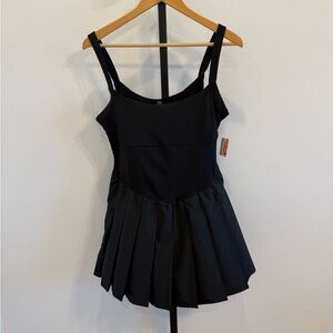 NWT Free People Movement Swing of Things Black Pleated Tennis Skort Dress Large